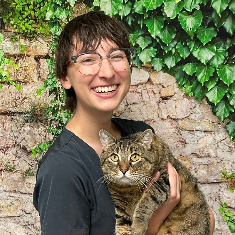Julia Client Service Representative Smiling With Her Cat